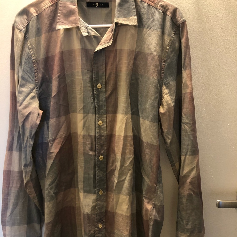 Casual men’s button down. Pale color plaid.